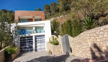 Resa estates Ibiza modern villa Cala llonga golf sale te koop entrance exterior.jpg